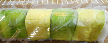 wrap the sliced avocado to the roll