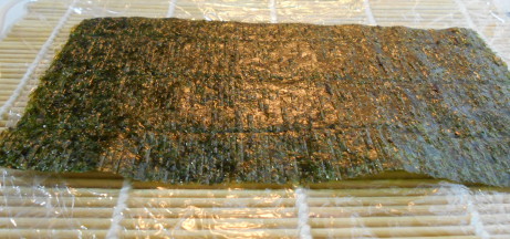 nora on bamboo mat